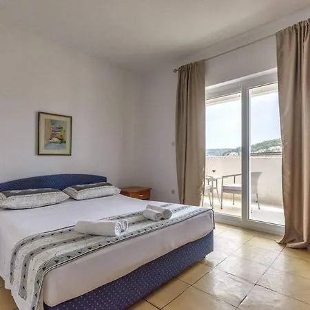 Two Bedroom Ap., Huge Terrace & Sandy Beach!